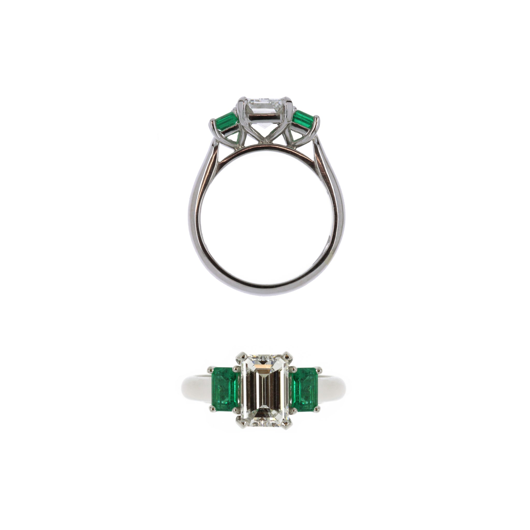 Platinum ring set with emerald cut centre diamond