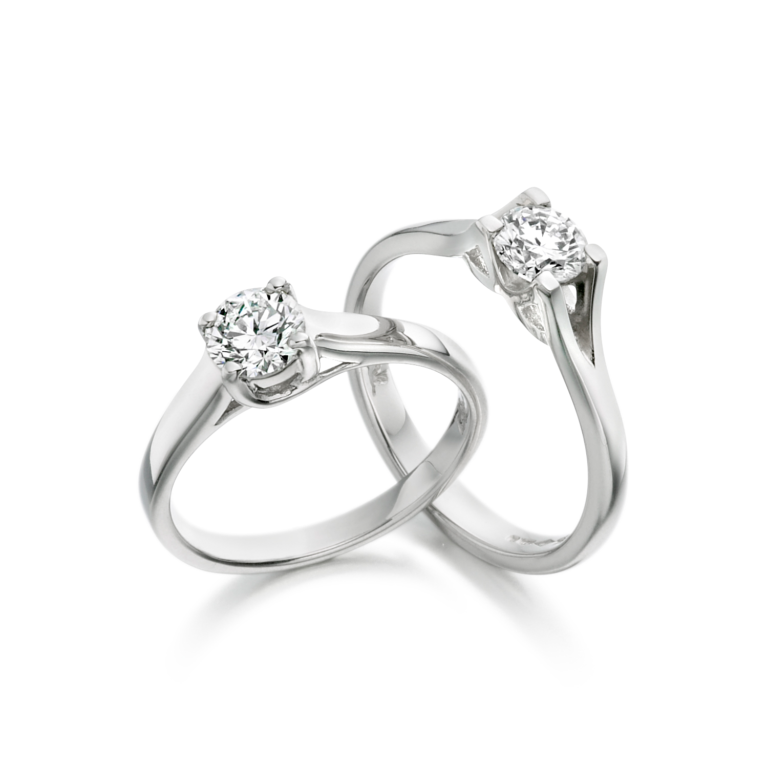Claw set solitaire diamond rings