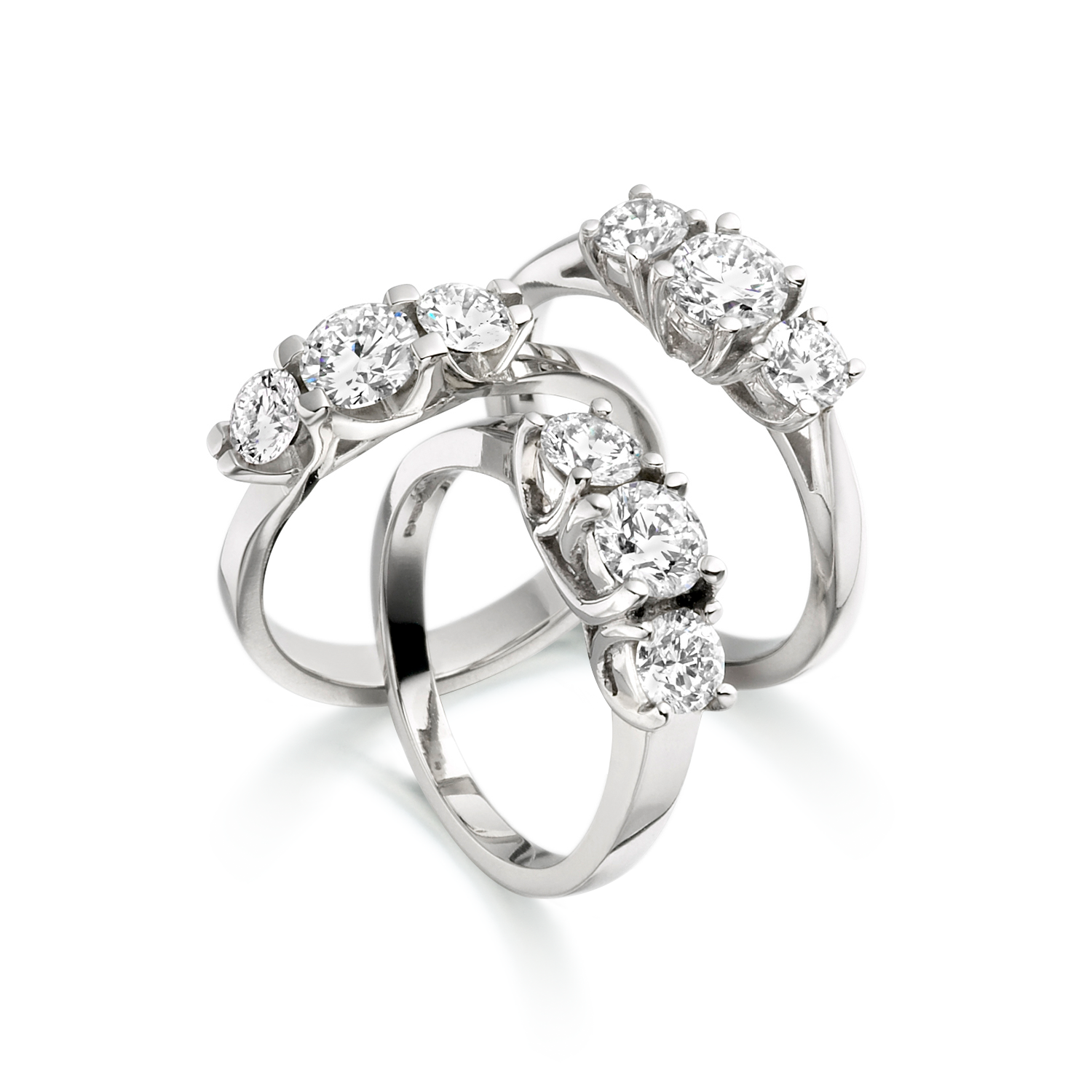 Three stone brilliant cut diamonds rings