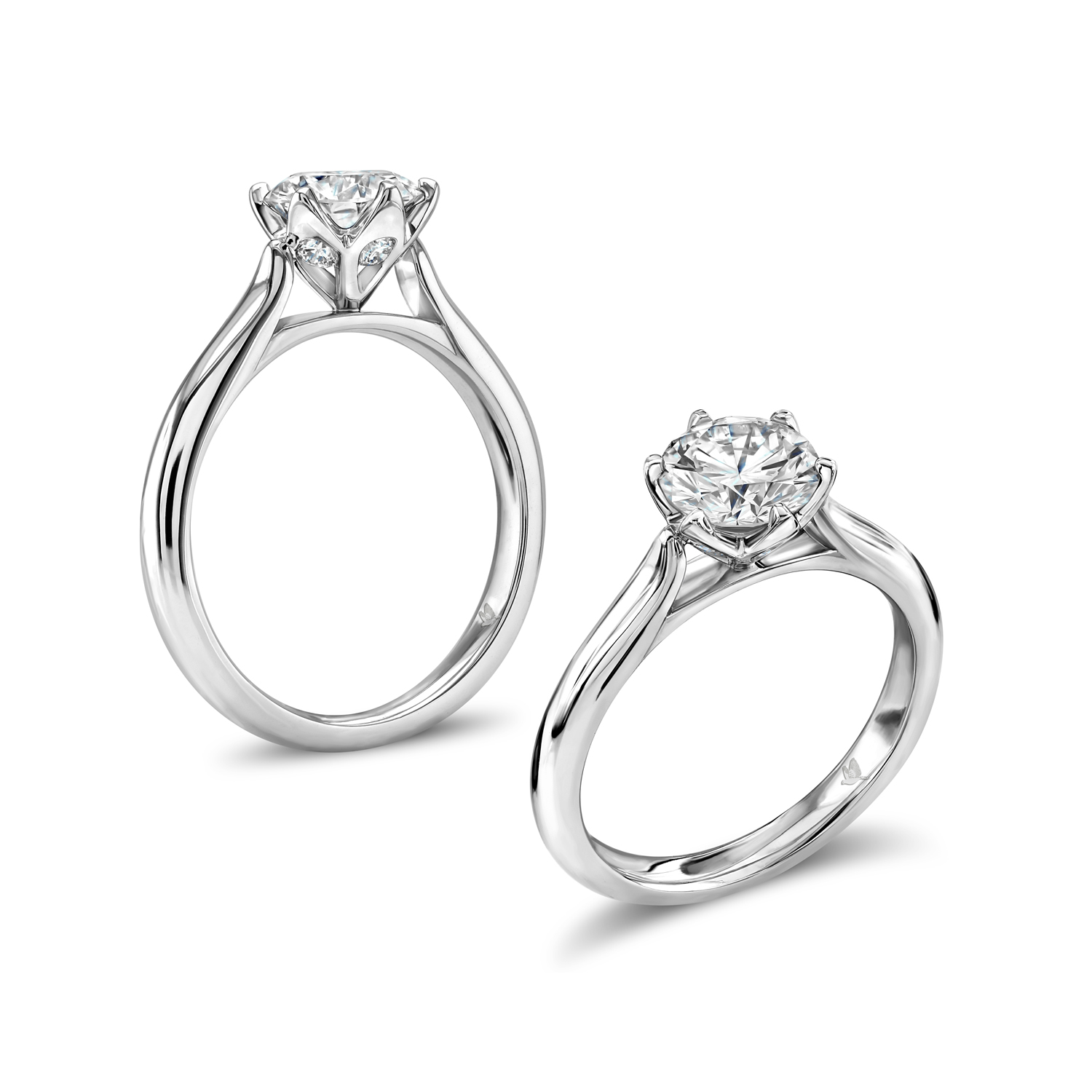 Six claw set brilliant cut diamond ring in petal setting