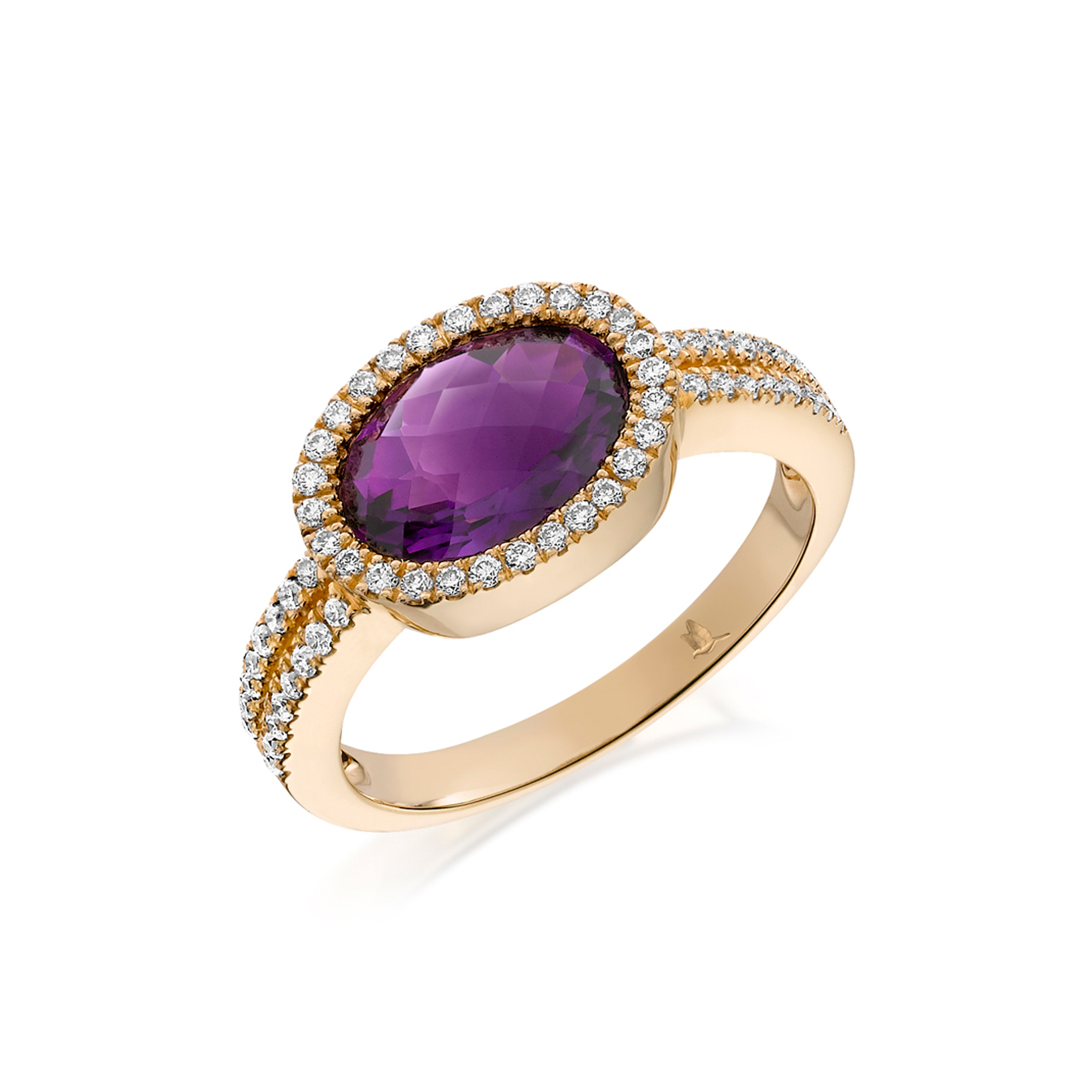 Oval amethyst ring with diamond surround