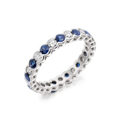 Round diamond and blue sapphire