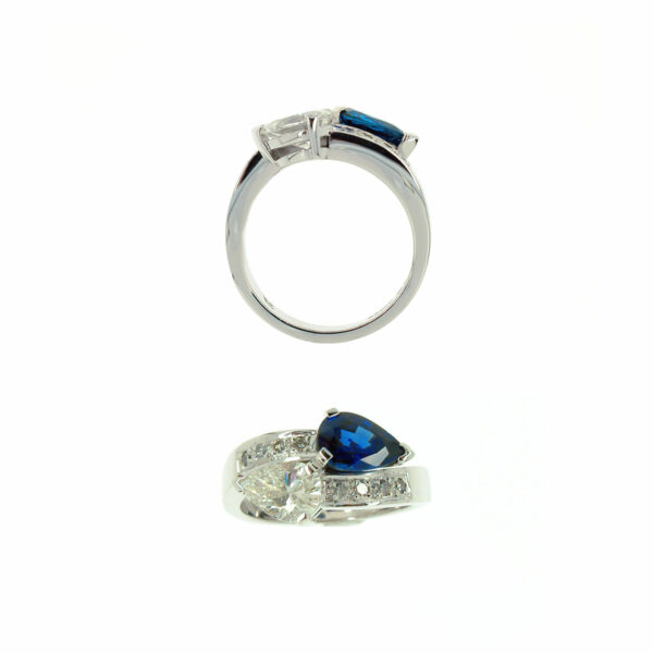 double headed pear shaped cross-over diamond and sapphire ring